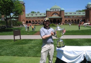 VIP Client holds PGA Trophy 